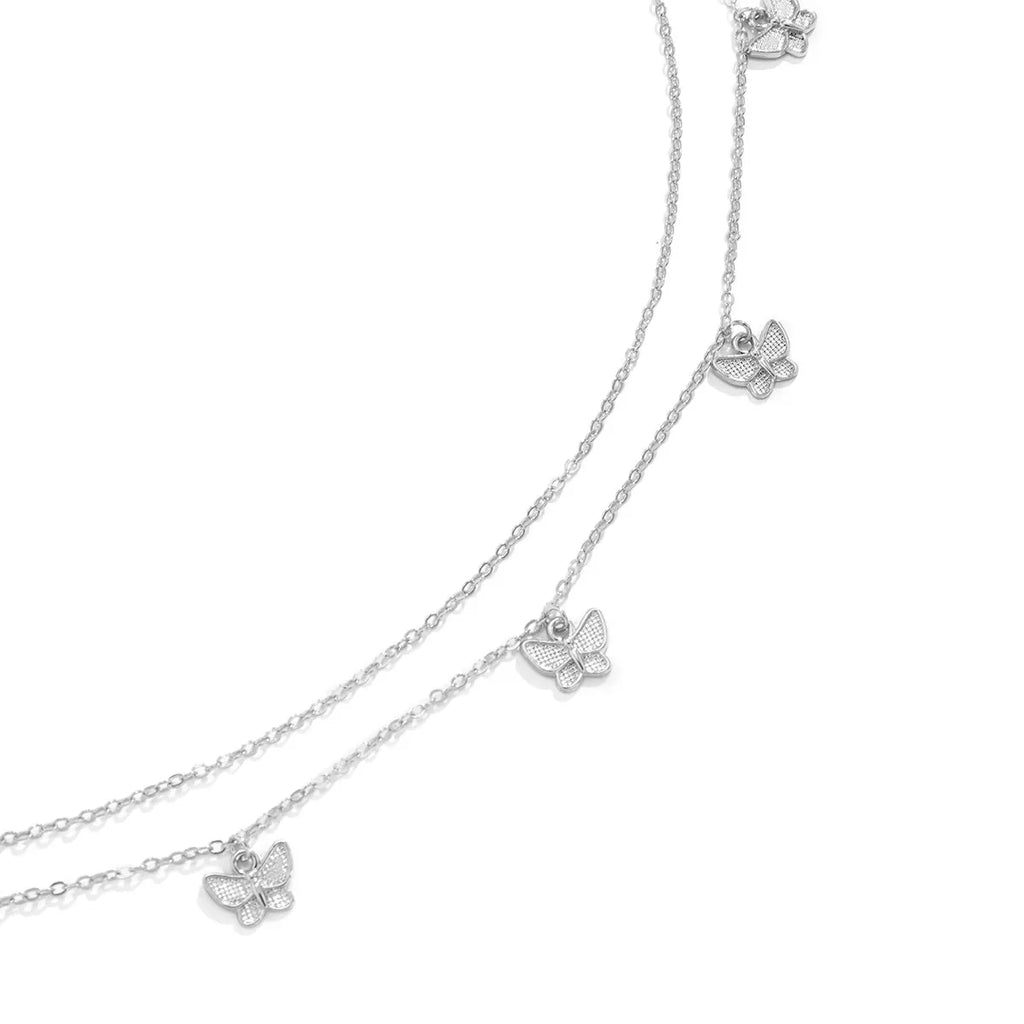 Chaîne de taille papillon rétro et mignonne pour femme.