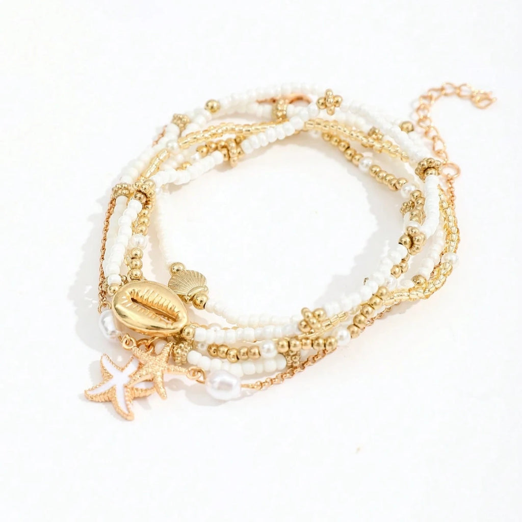 Ensemble de 6 bracelets de cheville empilables avec pendentifs en forme d'étoile de mer et coquillage, pour femme.