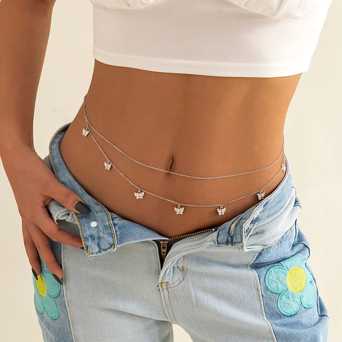 Chaîne de taille papillon rétro et mignonne pour femme.