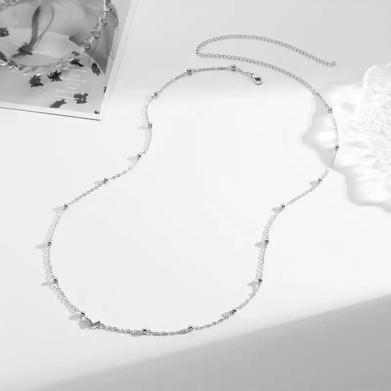 Chaînes de ventre doubles pour femmes, couleur or bijou de corps élégant et polyvalent.