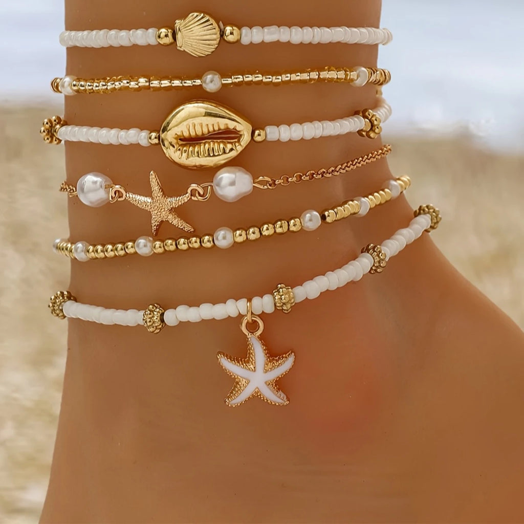 Ensemble de 6 bracelets de cheville empilables avec pendentifs en forme d'étoile de mer et coquillage, pour femme.