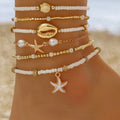 Ensemble de 6 bracelets de cheville empilables avec pendentifs en forme d'étoile de mer et coquillage, pour femme.