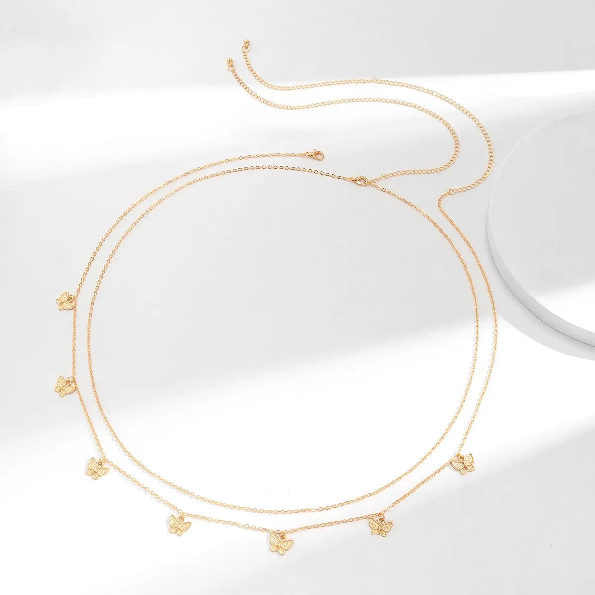 Chaîne de taille papillon rétro et mignonne pour femme.